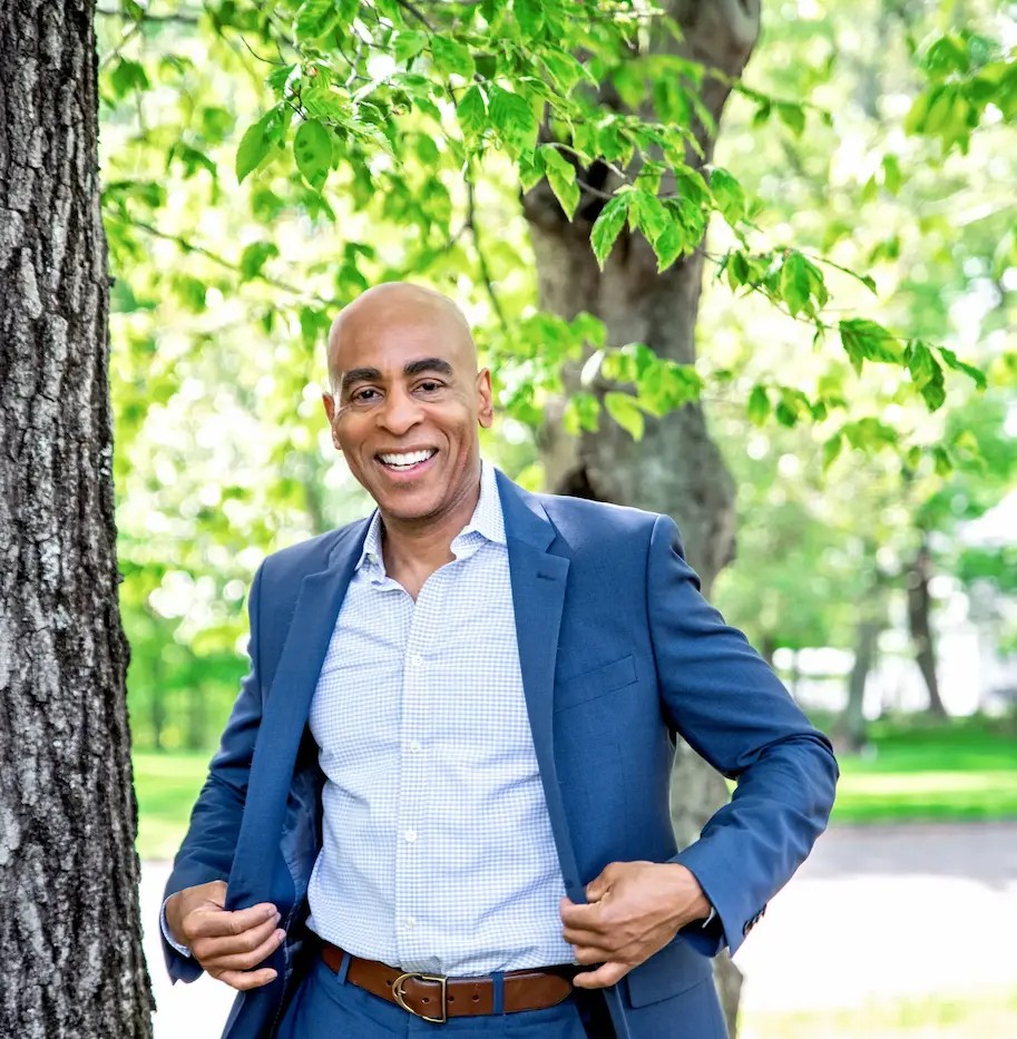 Terry Henry, founder of Dialed In Dating, in a blue suit